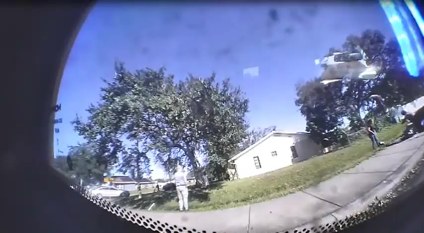 WATCH: FHP trooper saves life of motorcyclist found laying on sidewalk in Kissimmee